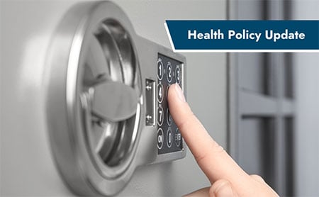 Finger pressing keypad on firearm safe with Health Policy Update text overlay