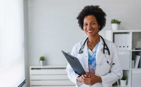 black-woman-doctor-standing-in-office_1200x740.jpg