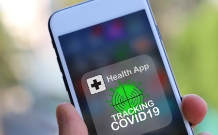 Smartphone with a COVID-19 Tracking app open
