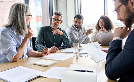Coworkers meeting at a conference table