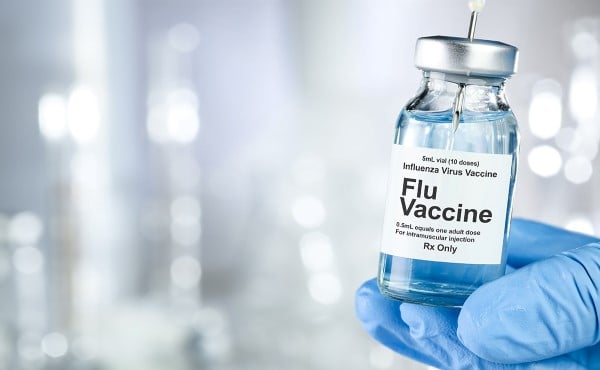 gloved-hand-holding-flu-vaccine-ampoule-with-needle-in-it_right-aligned_1200x740.jpg