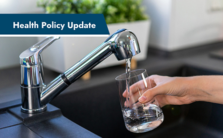 Filling a glass with water at the kitchen sink. Health Policy Update banner in upper-left